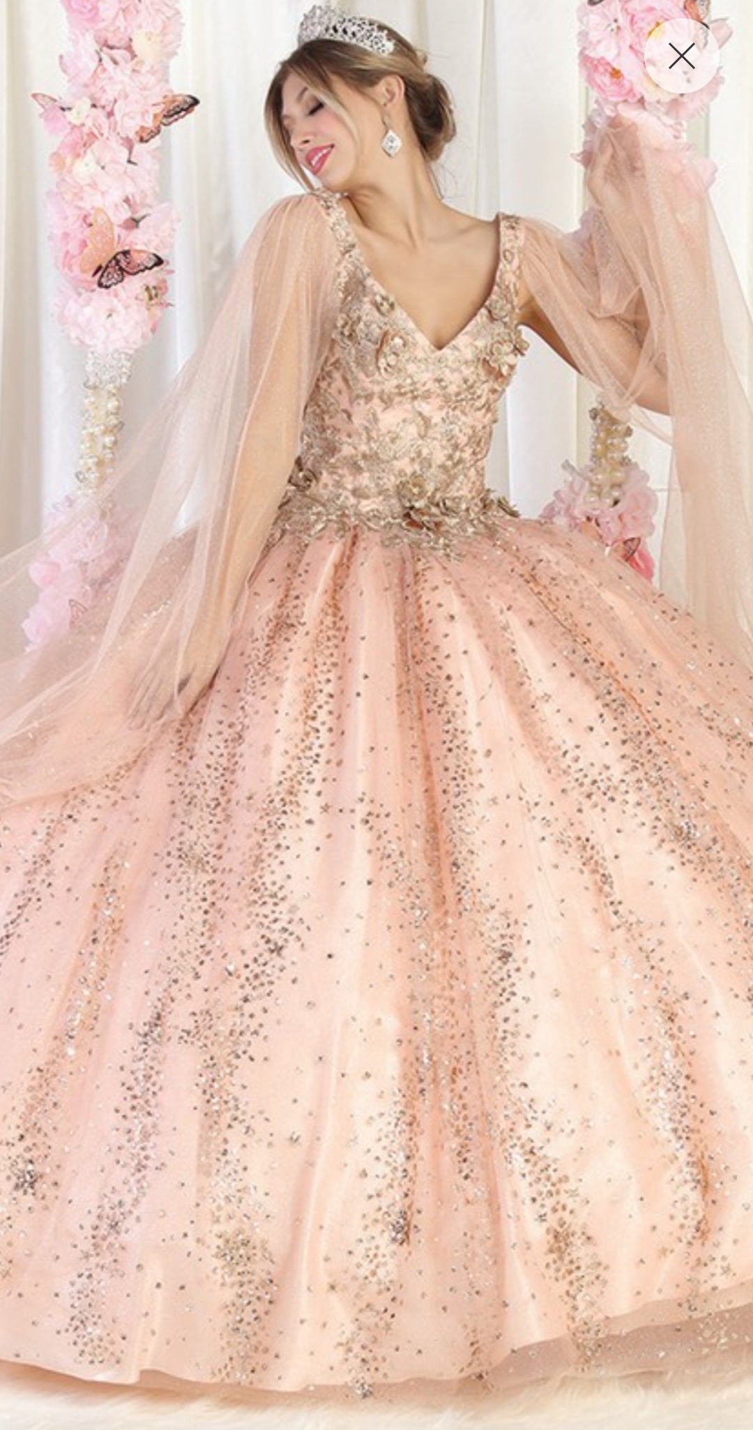 Rose gold quinceanera dress with gold glitter and sparkly crystals